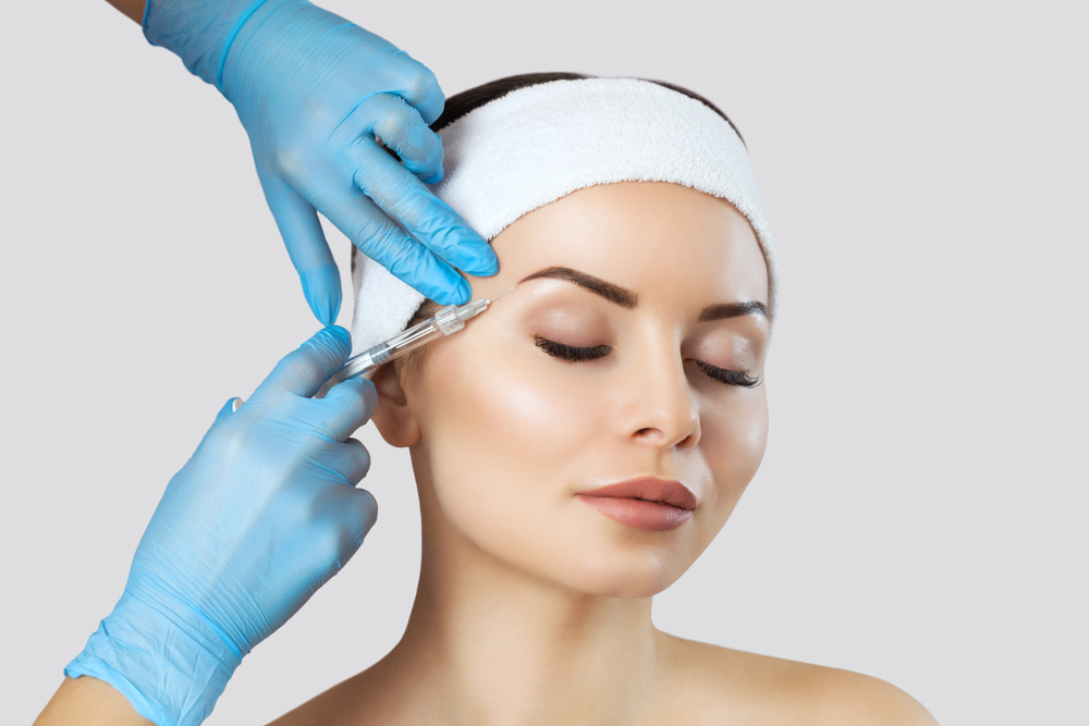 Woman with eyes closed getting PRP Therapy injections for youthful look in Tuscaloosa, AL